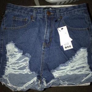 Distressed denim shorts